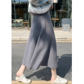 Knitted skirt for women in spring 2023, new style solid color sweater, versatile medium length high-waisted A-line sweater